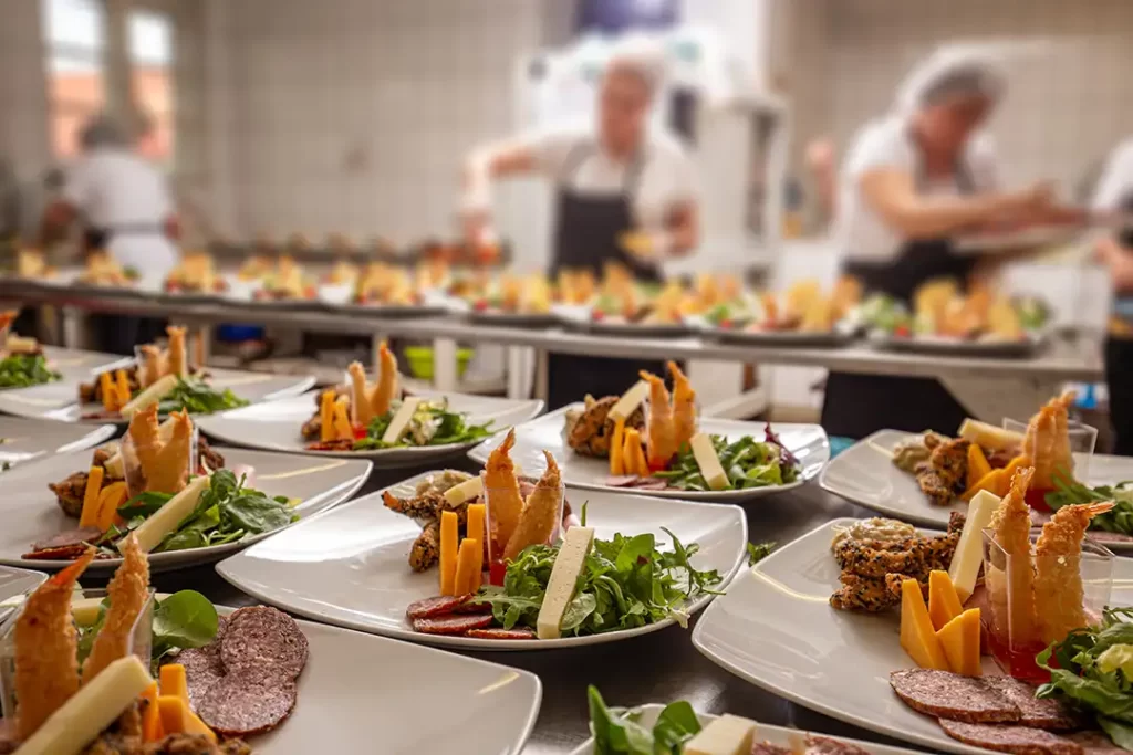 Material and technical base of a catering company with modern kitchen equipment and professional food preparation tools